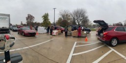 Farmington Hills employees volunteering at one of Forgotten Harvest's mobile food pantries.