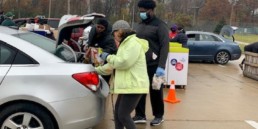 Farmington Hills employees volunteering at one of Forgotten Harvest's mobile food pantries.