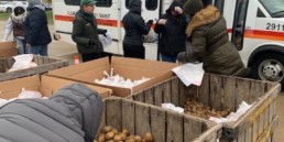 Farmington Hills employees volunteering at one of Forgotten Harvest's mobile food pantries.
