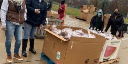 Farmington Hills employees volunteering at one of Forgotten Harvest's mobile food pantries.